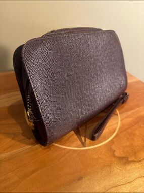 Authentic and numbered Louis Vuitton Taiga Baical Pochette.